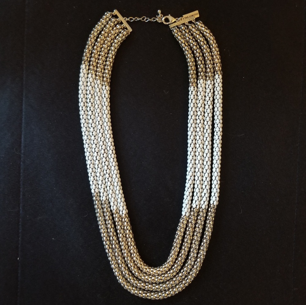 Muted gold and white multi-chain necklace